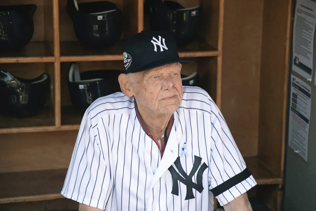 New York Yankees' Don Larsen sits in the dugout before the Yankees' Old-Timers' Day baseball game at Yankee Stadium in New York on June 17, 2018. (AP Photo/Bill Kostroun, File)
