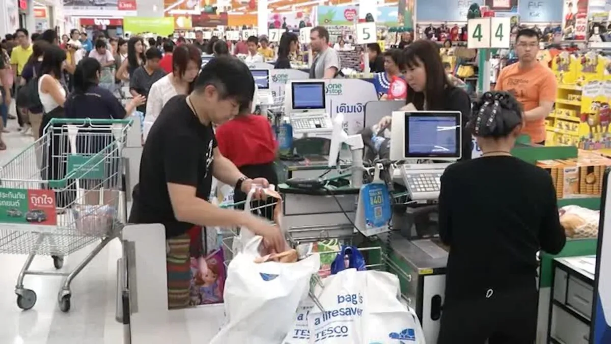 Shoppers at cashier counters in a supermarket in Bangkok, Thailand on Jan. 1, 2020. (Reuters)