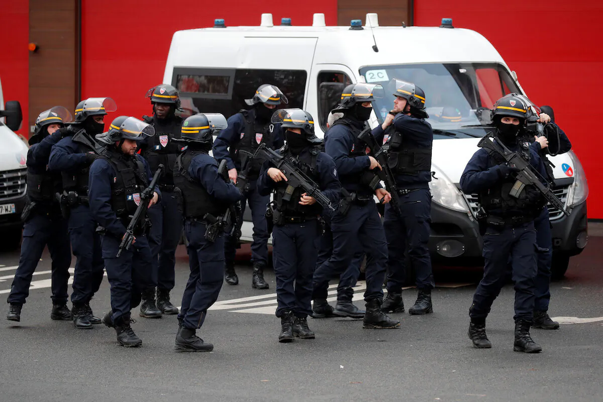 French police secure an area in Villejuif near Paris, France, on Jan. 3, 2020 after police shot dead a man who tried to stab several people in a public park. (Charles Platiau/Reuters)