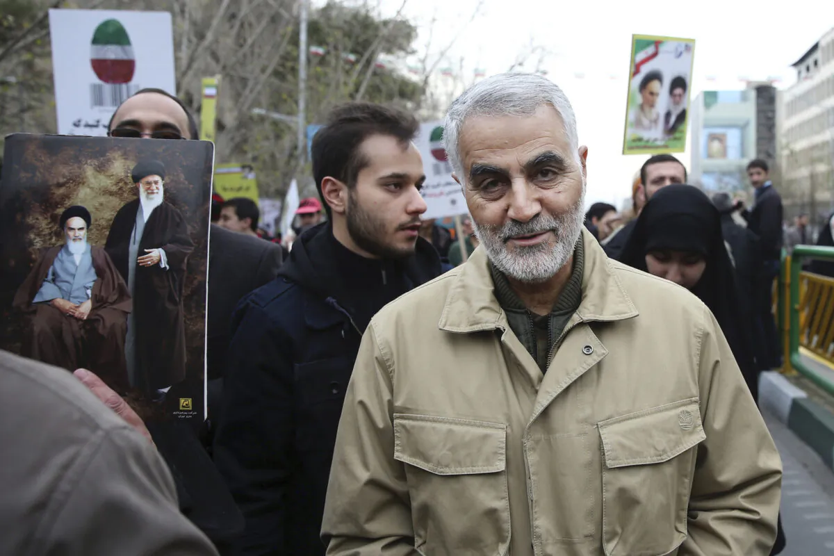 Qassem Soleimani, commander of Iran's Quds Force, attends an annual rally commemorating the anniversary of the 1979 Islamic revolution, in Tehran, Iran on Feb. 11, 2016. (AP Photo/Ebrahim Noroozi, File)