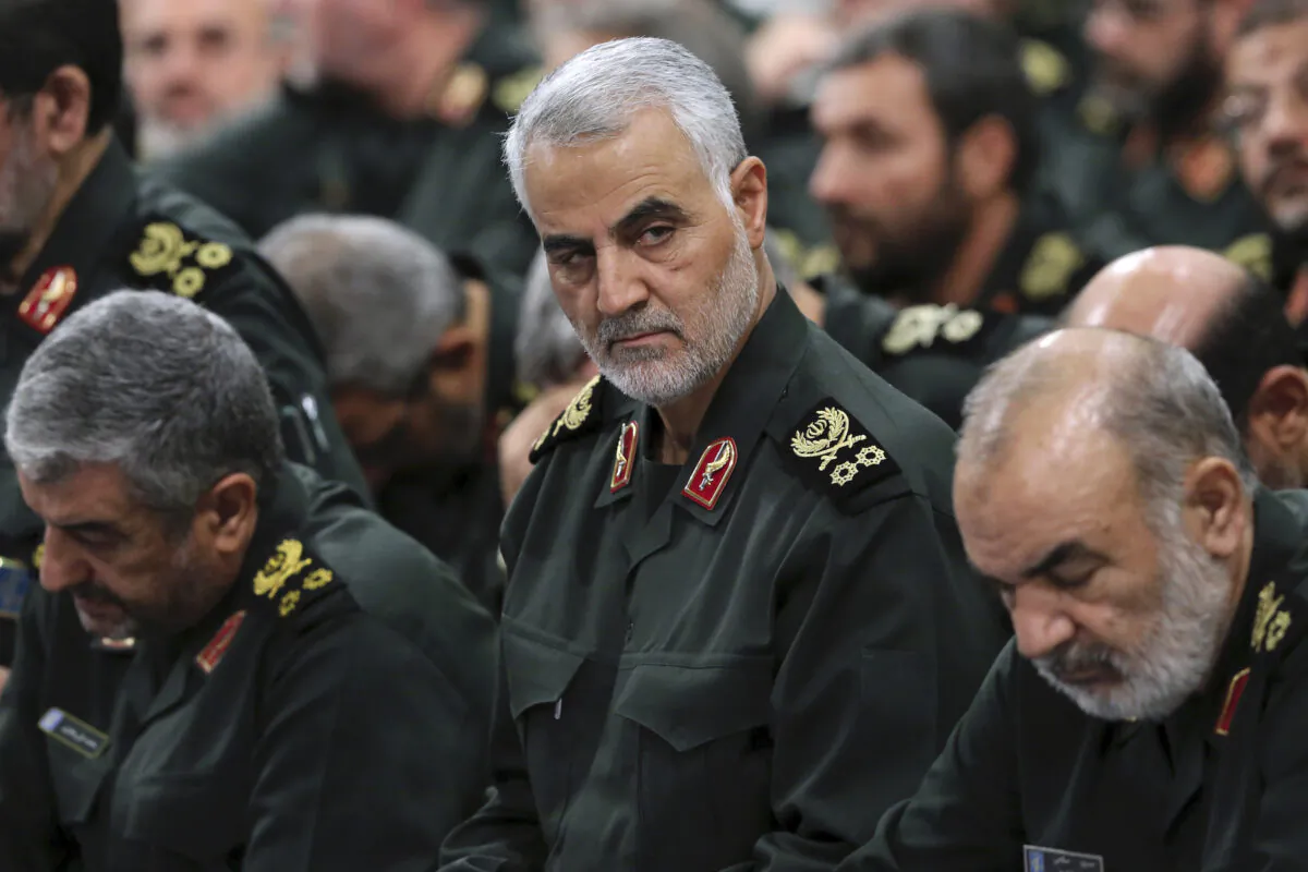 Revolutionary Guard Gen. Qassem Soleimani (C) attends a meeting in Tehran, Iran, on Sept. 18, 2016.  Office of the Iranian Supreme Leader via AP