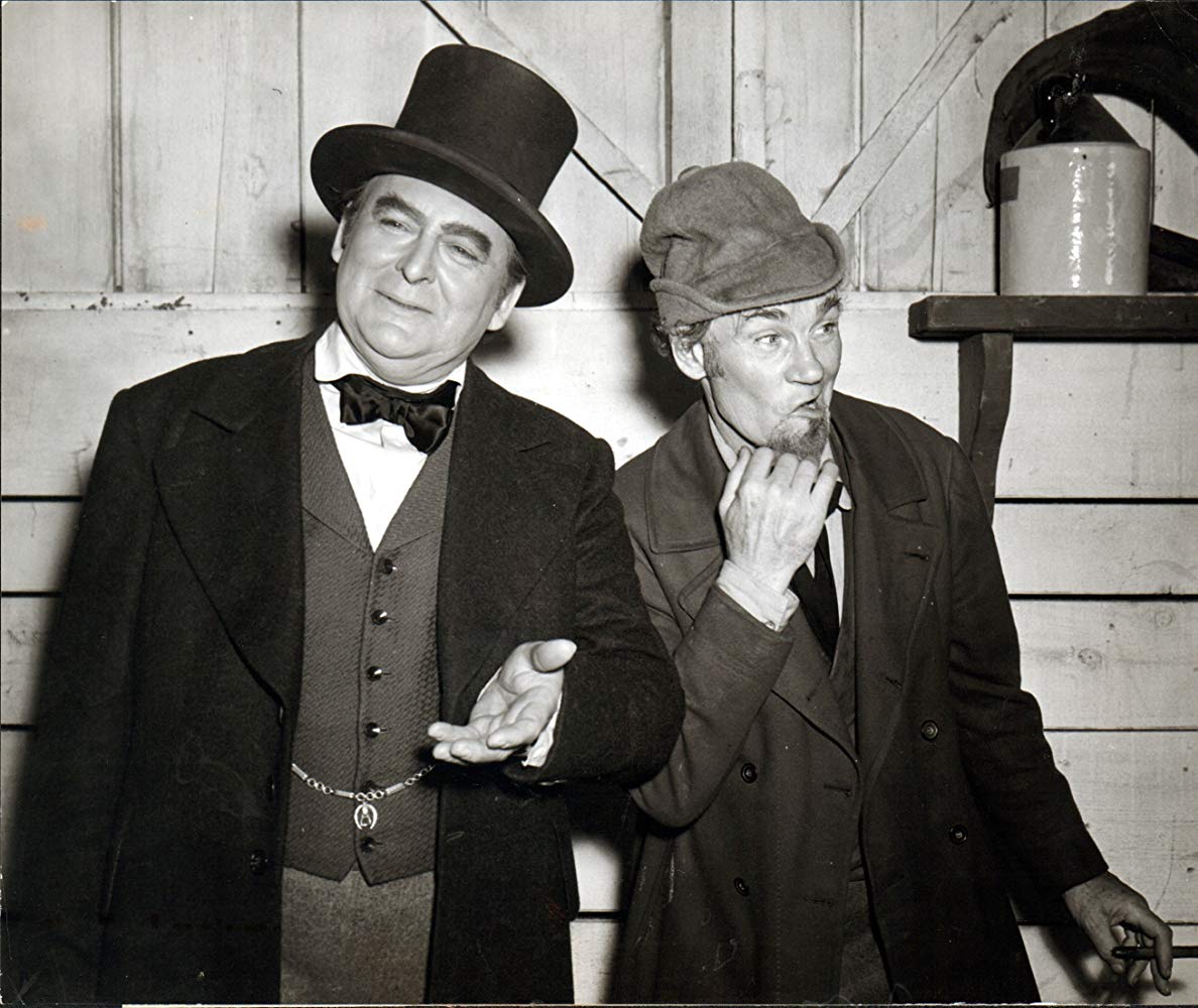 Edward Arnold (L) as Daniel Webster and Walter Huston as Mr. Scratch in the 1941 film “The Devil and Daniel Webster,” originally titled  “All That Money Can Buy.” (RKO Radio Productions)