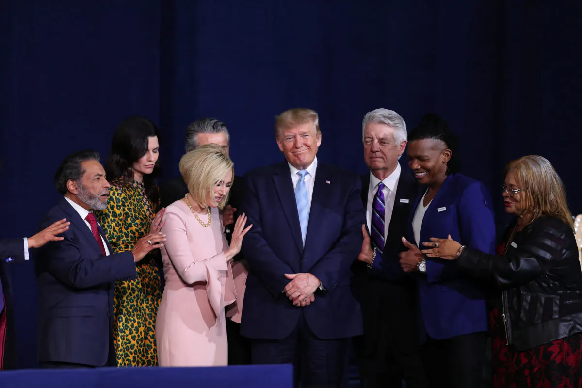 Evangelical leaders gather on stage with President Donald Trump during an Evangelicals for Trump campaign event held at the King Jesus International Ministry in Miami, Florida on Jan. 3, 2020. (Joe Raedle/Getty Images)