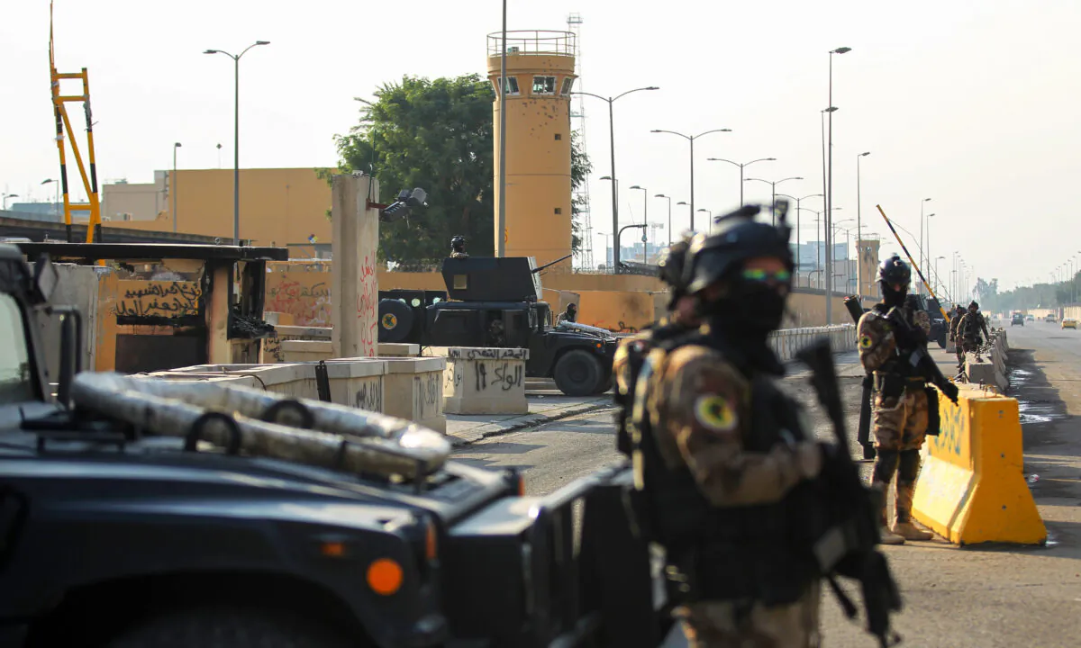 Iraqi counterterrorism forces stand guard in front of the US Embassy in Baghdad on Jan. 2, 2020. (Ahmad Al-Rubaye/AFP via Getty Images)