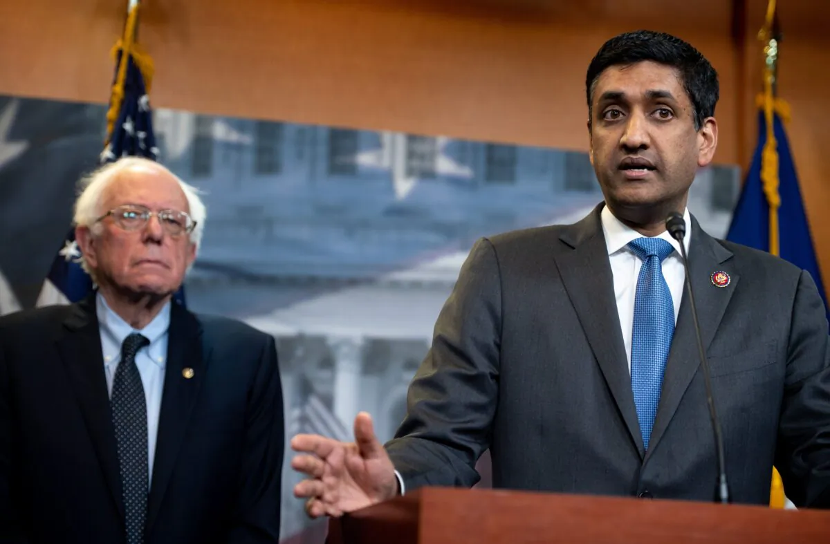 Rep. Ro Khanna (D-Calif.) (R) and Sen. Bernie Sanders (I-Vt.) at a press conference in Washington in an April 2019 file photograph. (Saul Loeb/AFP via Getty Images)