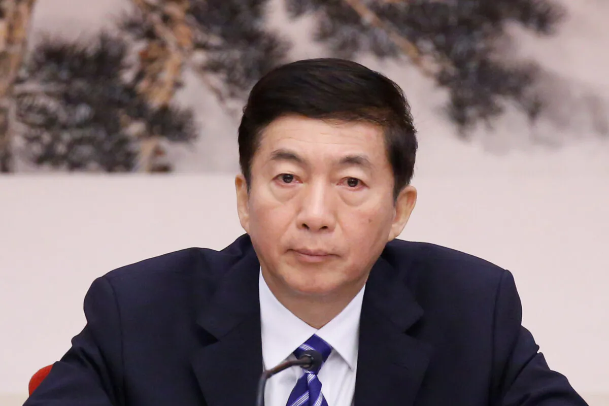 Communist Party Secretary of Shanxi province Luo Huining attends a session of his province on the second day of the 19th National Congress of the Communist Party of China at the Great Hall of the People in Beijing, October 19, 2017. (Reuters/Thomas Peter)