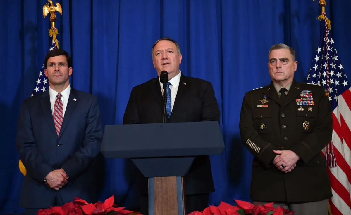 Secretary of State Mike Pompeo (C), Secretary of Defense Mark Esper (L) and Chairman of the Joint Chiefs of Staff US army general Mark A. Milley (R) speak on stage during a briefing on the past 72 hours events in Mar a Lago, Palm Beach, Fla., on Dec. 29, 2019. (Nicholas Kamm/AFP via Getty Images)