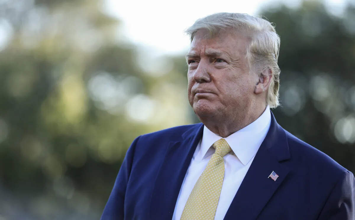 President Donald Trump speaks to media before departing the White House on Marine One on Oct. 11, 2019. (Charlotte Cuthbertson/The Epoch Times)