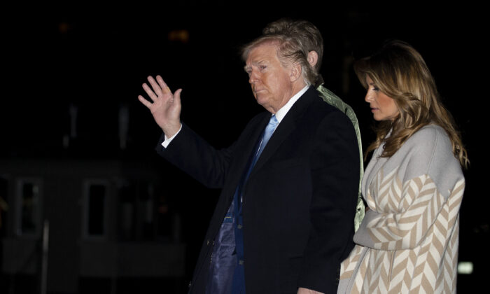 President Donald Trump and First Lady Melania Trump arrive at the White House in Washington on Jan. 5, 2020. The Trumps were returning from spending the holidays at Mar-a-Lago in Palm Beach, Fla.(Tasos Katopodis/Getty Images)