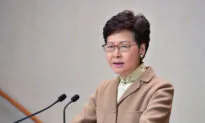 Hong Kong Leader Lam Commits to Working Closely With New Beijing Envoy
