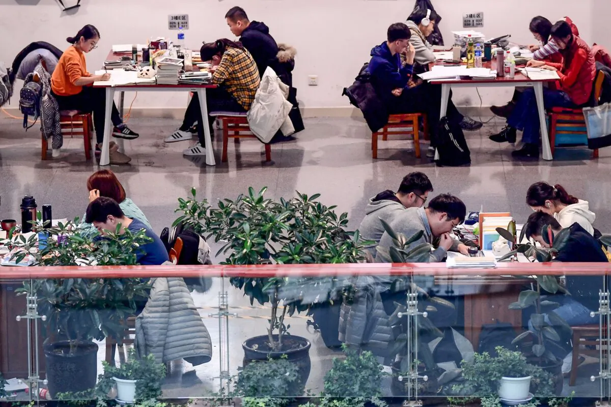 University students are seen preparing for the upcoming National Postgraduate Entrance Exam (NPEE) at a library in Shenyang in China's northeastern Liaoning Province on Nov. 26, 2019. (STR/AFP via Getty Images)