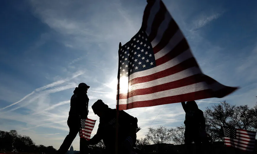 U.S. military veterans set up 1,892 American flags on the National Mall in Washington on March 27, 2014. (Win McNamee/Getty Images)