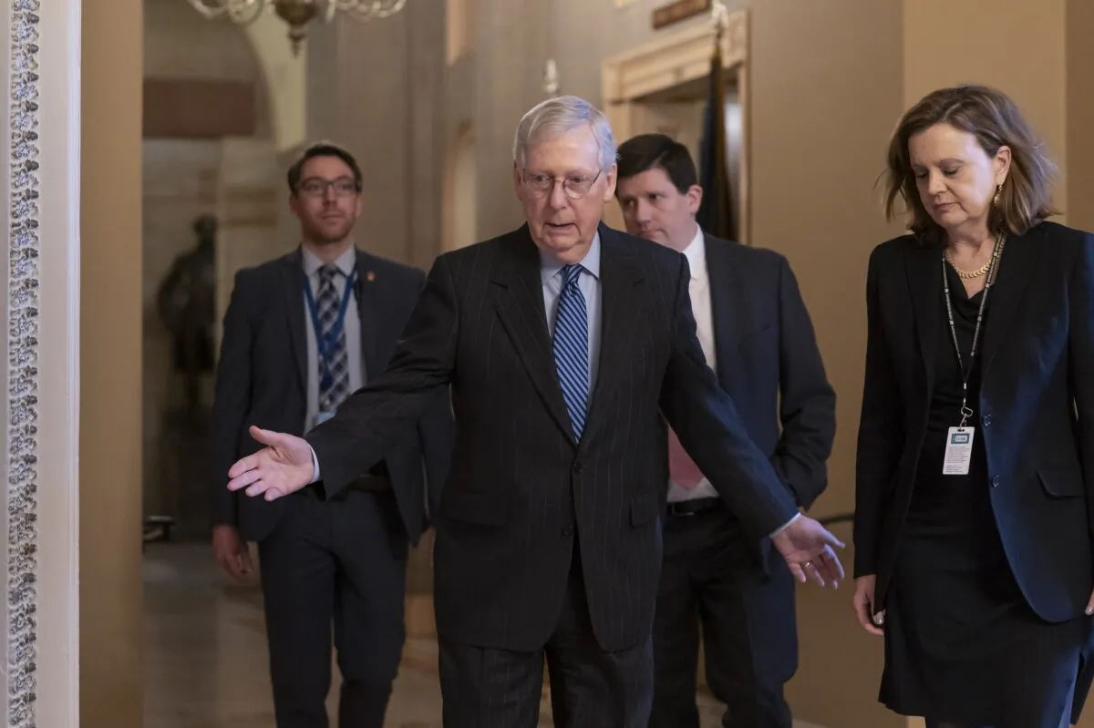 Senate Majority Leader Mitch McConnell (R-Ky.) arrives for a closed meeting with fellow Republicans as he strategizes about the looming impeachment trial of President Donald Trump, at the Capitol in Washington on Jan. 7, 2020. (J. Scott Applewhite/AP Photo)