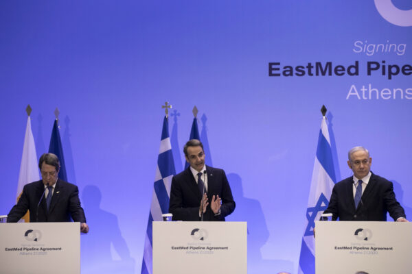 Israeli Prime Minister Benjamin Netanyahu (R) Greece's Prime Minister Kyriakos Mitsotakis,(C) and Cypriot President Nicos Anastasiadis, (L) attend a joint news briefing, in Athens, Thursday, Jan. 2, 2020. The leaders of Greece, Israel and Cyprus met in Athens to sign EastMed pipeline deal. (Yorgos Karahalis/AP Photo)