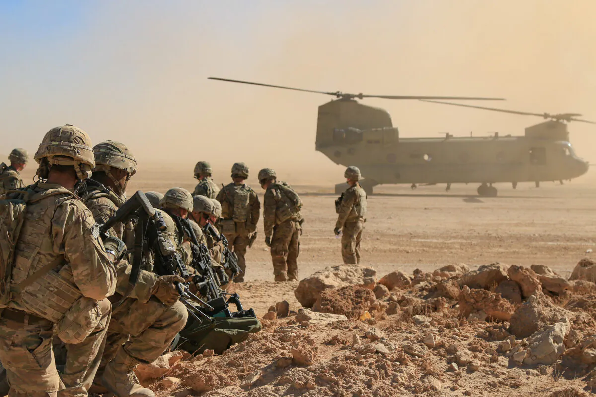U.S. soldiers at a live-fire exercise at the Al-Asad Airbase in Iraq, in this file photo dated Oct. 31, 2018. (1st Lt. Leland White/U.S. Army National Guard photo)