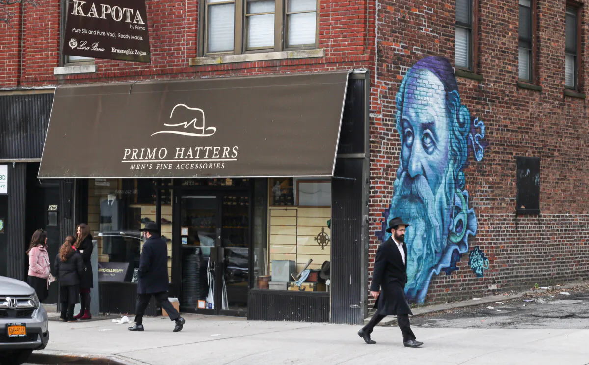 Jewish people walk around in the Crown Heights neighborhood in Brooklyn, New York on Jan. 7, 2020. (Chung I Ho/The Epoch Times)