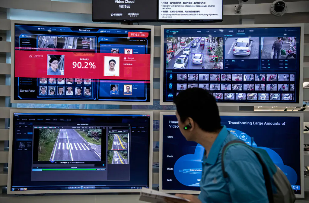 A display for facial recognition and artificial intelligence is seen on monitors at Huawei's Bantian campus in Shenzhen, China, on April 26, 2019. (Kevin Frayer/Getty Images)