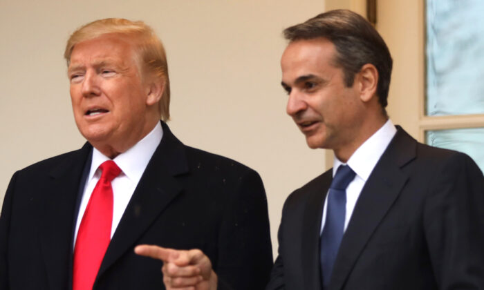 President Donald Trump poses for photos with Prime Minister of Greece Kyriakos Mitsotakis at the West Wing colonnade of the White House on Jan. 7, 2020. (Alex Wong/Getty Images)