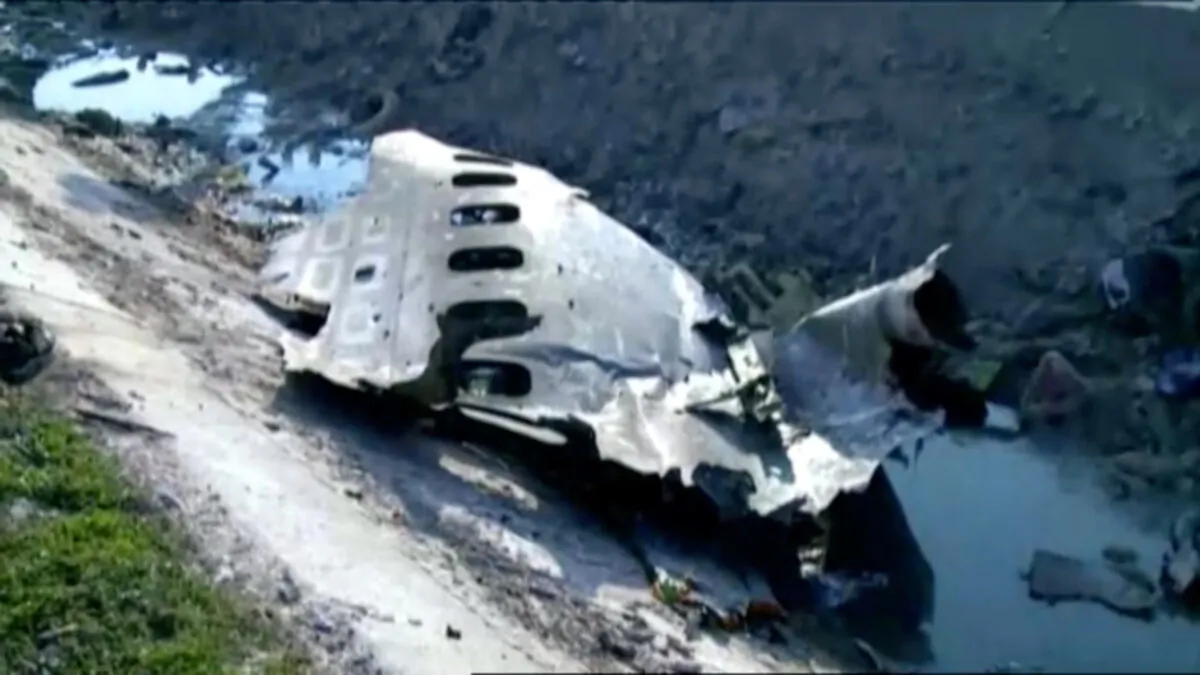 Part of the wreckage from Ukraine International Airlines flight PS752, a Boeing 737-800 plane that crashed after taking off from Tehran's Imam Khomeini airport on Jan. 8, 2020, is seen in this still image taken from Iran Press footage. (Iran Press/Handout via Reuters)