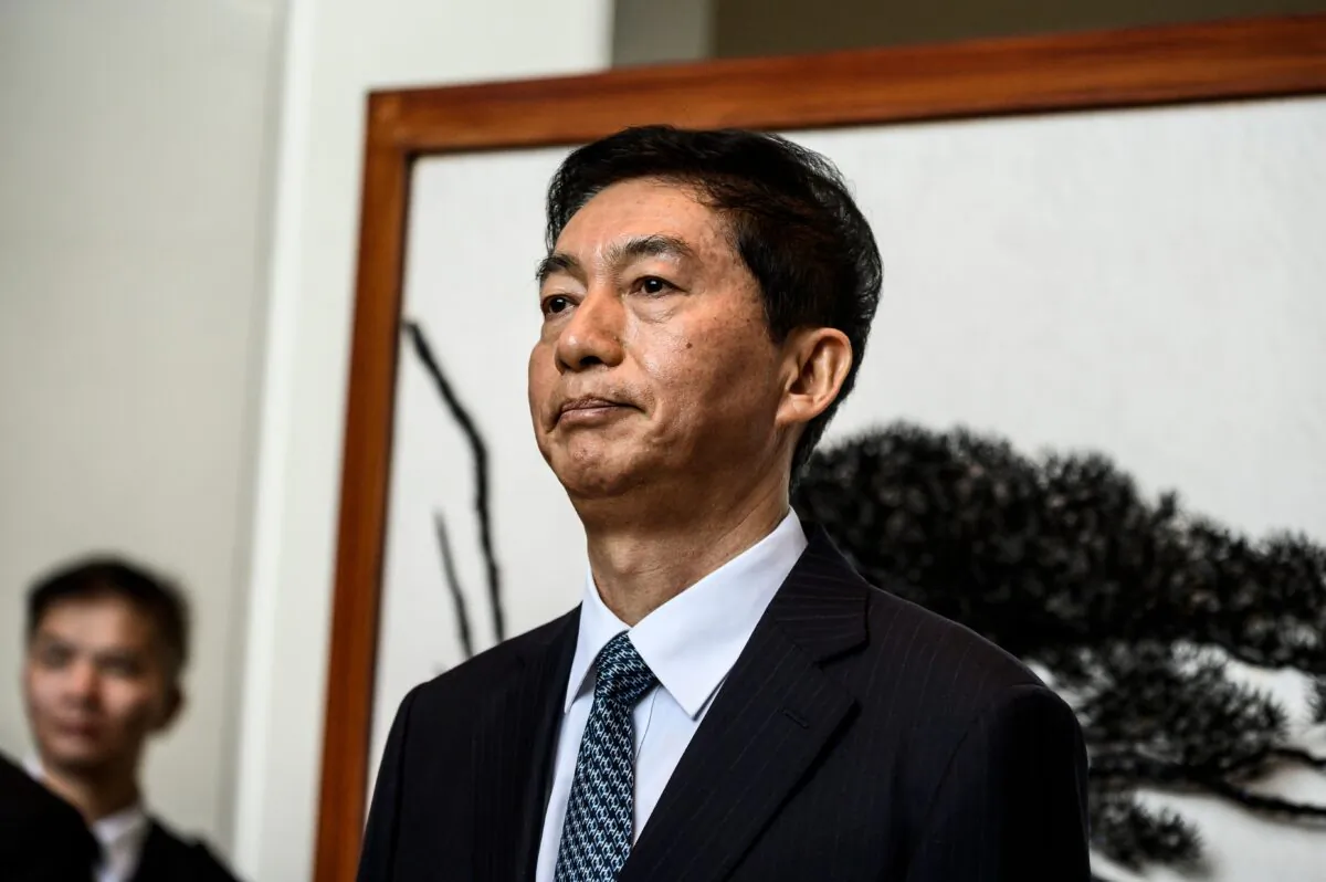 Luo Huining, the new head of the Chinese liaison office in Hong Kong, speaks briefly with the media in Hong Kong on January 6, 2020. (STR/AFP via Getty Images)