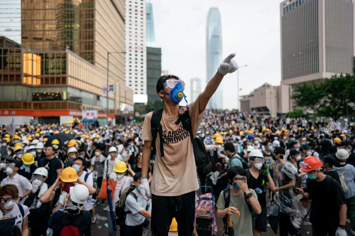 A protester makes a gesture during a protest in Hong Kong on June 12, 2019. (Anthony Kwan/Getty Images)