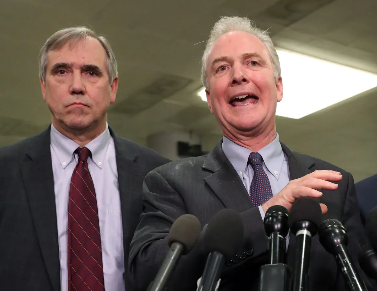Sen. Chris Van Hollen (D-Md.) speaks while flanked by Sen. Jeff Merkley (D-Ore.) (L), after attending a briefing with administration officials about the situation with Iran, at the U.S. Capitol in Washington on Jan. 8, 2020. (Mark Wilson/Getty Images)