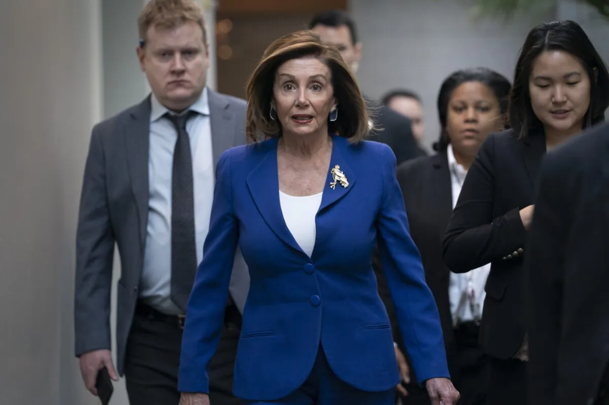 House Speaker Nancy Pelosi (D-Calif.) arrives to meet with other House Democrats on the morning following Iranian attacks on bases in Iraq housing U.S. troops, at the Capitol in Washington on Jan. 8, 2020. (J. Scott Applewhite/AP Photo)