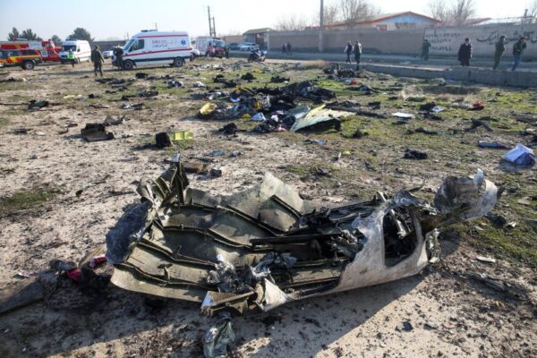 Debris of a plane belonging to Ukraine International Airlines, that crashed after taking off from Iran's Imam Khomeini airport, is seen on the outskirts of Tehran