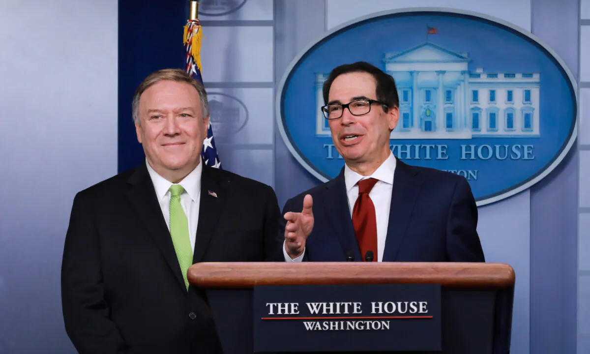 Secretary of State Mike Pompeo (L) and Secretary of the Treasury Steve Mnuchin at a media conference in the White House briefing room in Washington on Jan. 10, 2020. (Charlotte Cuthbertson/The Epoch Times)