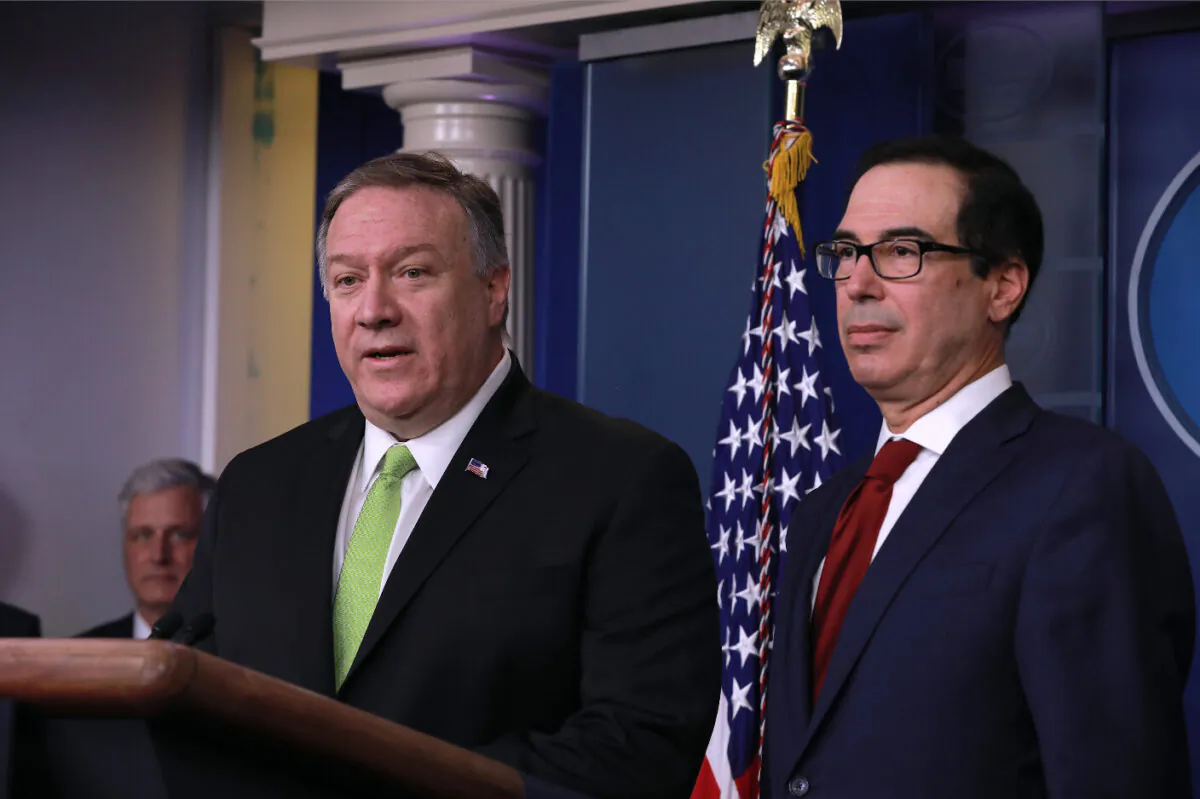 Secretary of State Mike Pompeo (L) and Secretary of the Treasury Steve Mnuchin at a media conference in the White House briefing room in Washington on Jan. 10, 2020. (Charlotte Cuthbertson/The Epoch Times)