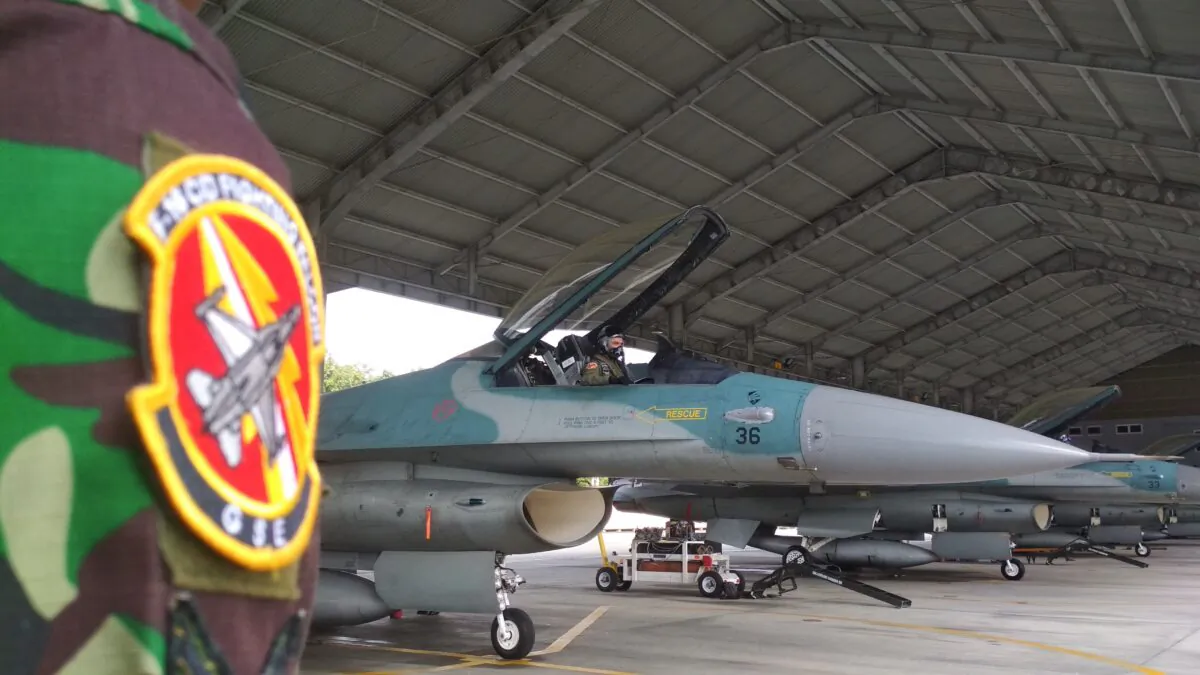 An Indonesian air force pilot prepares for taking off in an F-16 at air base in Pekanbaru, Riau on Jan. 7, 2020. Indonesia has deployed fighter jets and warships to patrol islands near the disputed South China Sea, the military said on Jan. 8, escalating tensions with Beijing after a diplomatic spat over "trespassing" Chinese vessels. (STR/AFP via Getty Images)