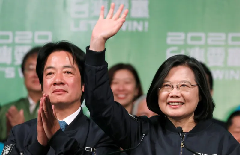 Incumbent Taiwan President Tsai Ing-wen and Vice President-elect William Lai wave to their supporters after their election victory at a rally, outside the Democratic Progressive Party (DPP) headquarters in Taipei, Taiwan Jan. 11, 2020. (Reuters/Tyrone Siu)