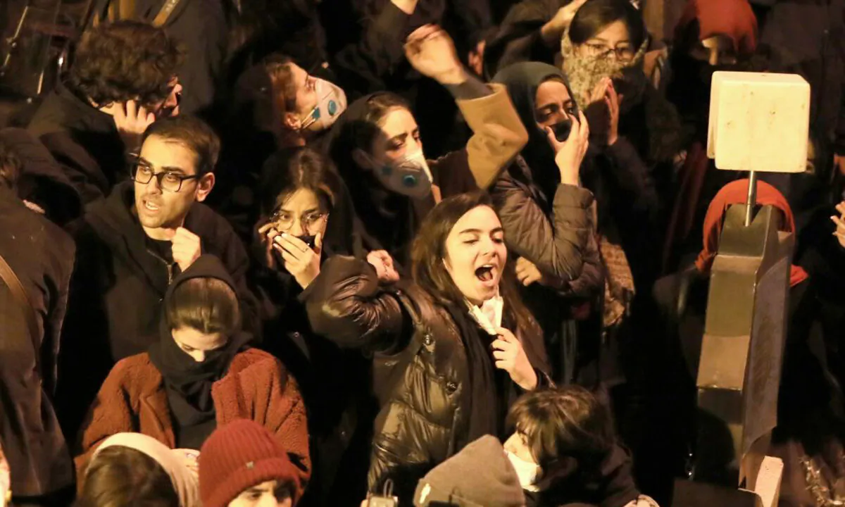 Iranians students chant slogans as they demonstrate following a tribute for the victims of Ukraine International Airlines Boeing 737 in front of the Amirkabir University in the capital Tehran, on Jan. 11, 2020. (Atta Kenare/AFP via Getty Images)