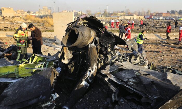 Debris at the scene where a Ukrainian plane crashed in Shahedshahr southwest of the capital Tehran, Iran on Jan. 8, 2020. (Ebrahim Noroozi/AP Photo)