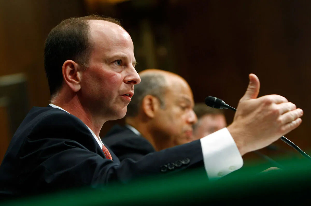 Assistant Attorney General David Kris (L) of the Justice Department's National Security Division testifies before the Senate Armed Services Committee in Washington on July 7, 2009. (Win McNamee/Getty Images)