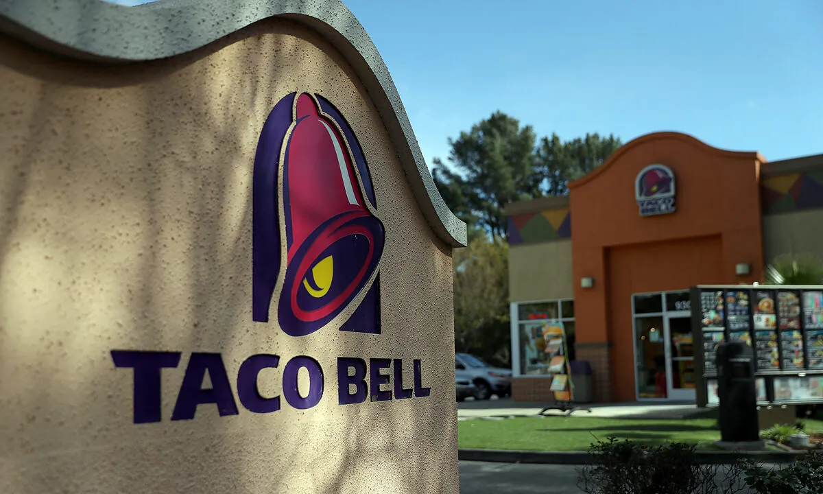 A sign is posted in front of a Taco Bell restaurant in Novato, Calif., on Feb. 22, 2018. (Justin Sullivan/Getty Images)