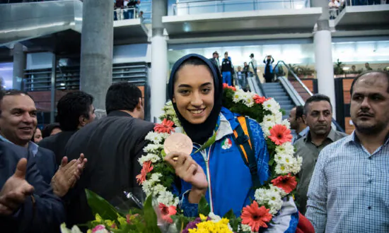 Iran’s Only Female Olympic Medalist Says She Has Defected