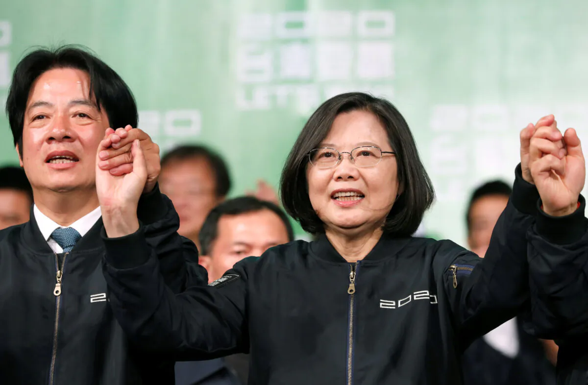 Incumbent Taiwan President Tsai Ing-wen and Vice President-elect William Lai attend a rally after their election victory, outside the Democratic Progressive Party (DPP) headquarters in Taipei, Taiwan on Jan. 11, 2020. (Tyrone Siu/Reuters)