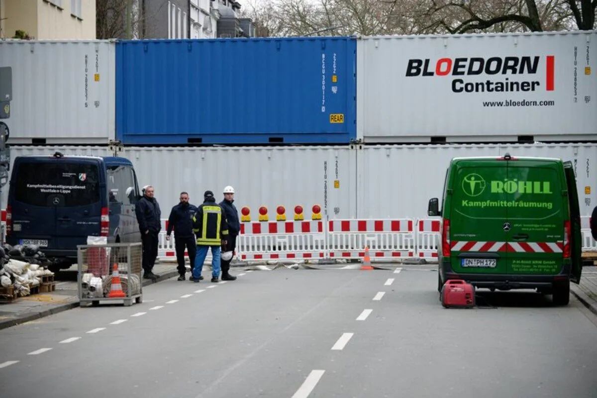 A road is blocked with containers in Dortmund, Germany, on Jan. 12, 2020. (Henning Kaiser/dpa via AP)