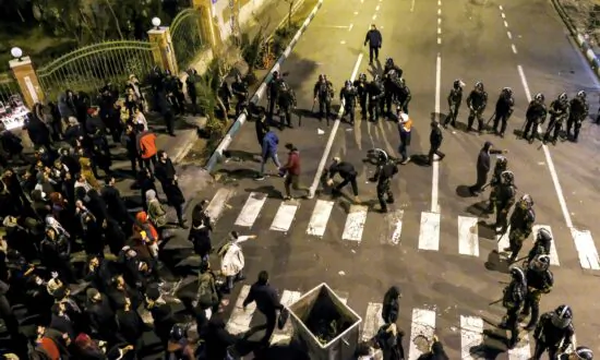 Iranian Police Deny Reports of Officers Firing on Protesters