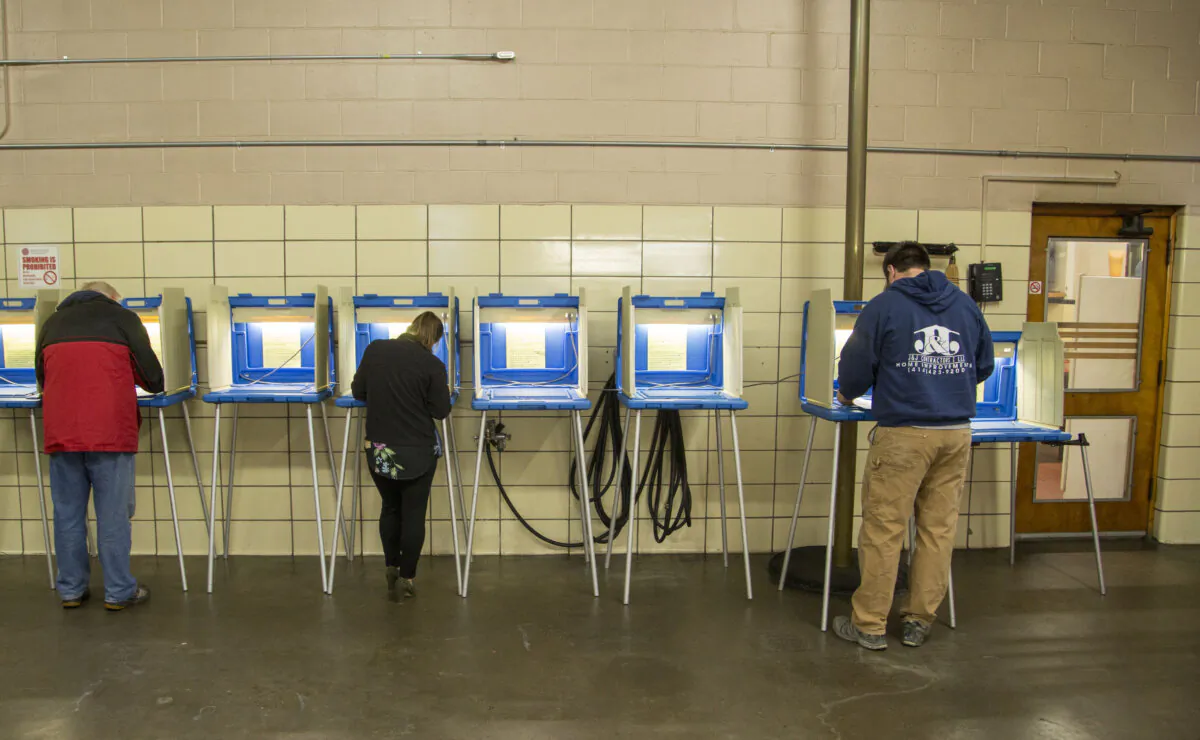 Voters cast their midterm ballots at the District 5 Ward 83 firehouse in Milwaukee, Wisconsin, on Nov. 6, 2018. (Darren Hauck/Getty Images)