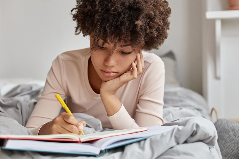 Each night, take time to write down what’s on your mind. Somehow, getting it down on paper allows your mind to relax. (Shutterstock)