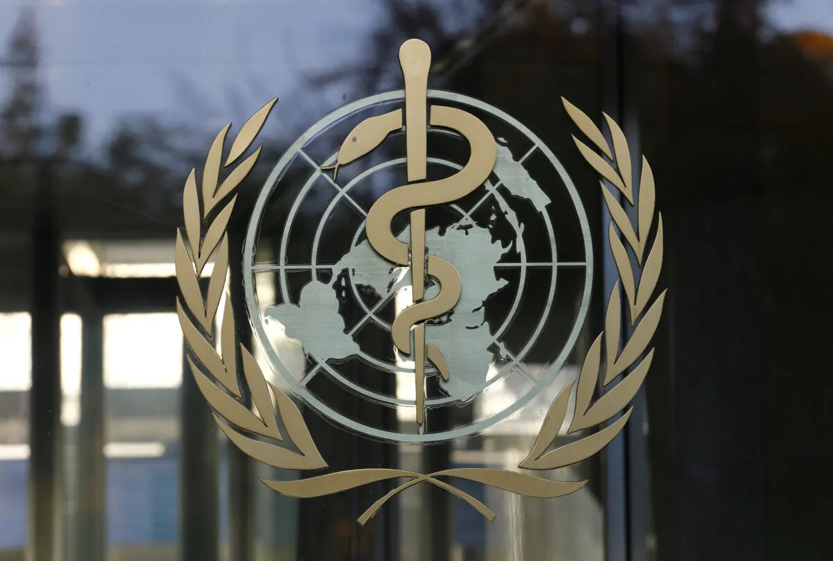 A logo of the World Health Organization (WHO) at WHO headquarters in Geneva, Switzerland. (REUTERS/Denis Balibouse)