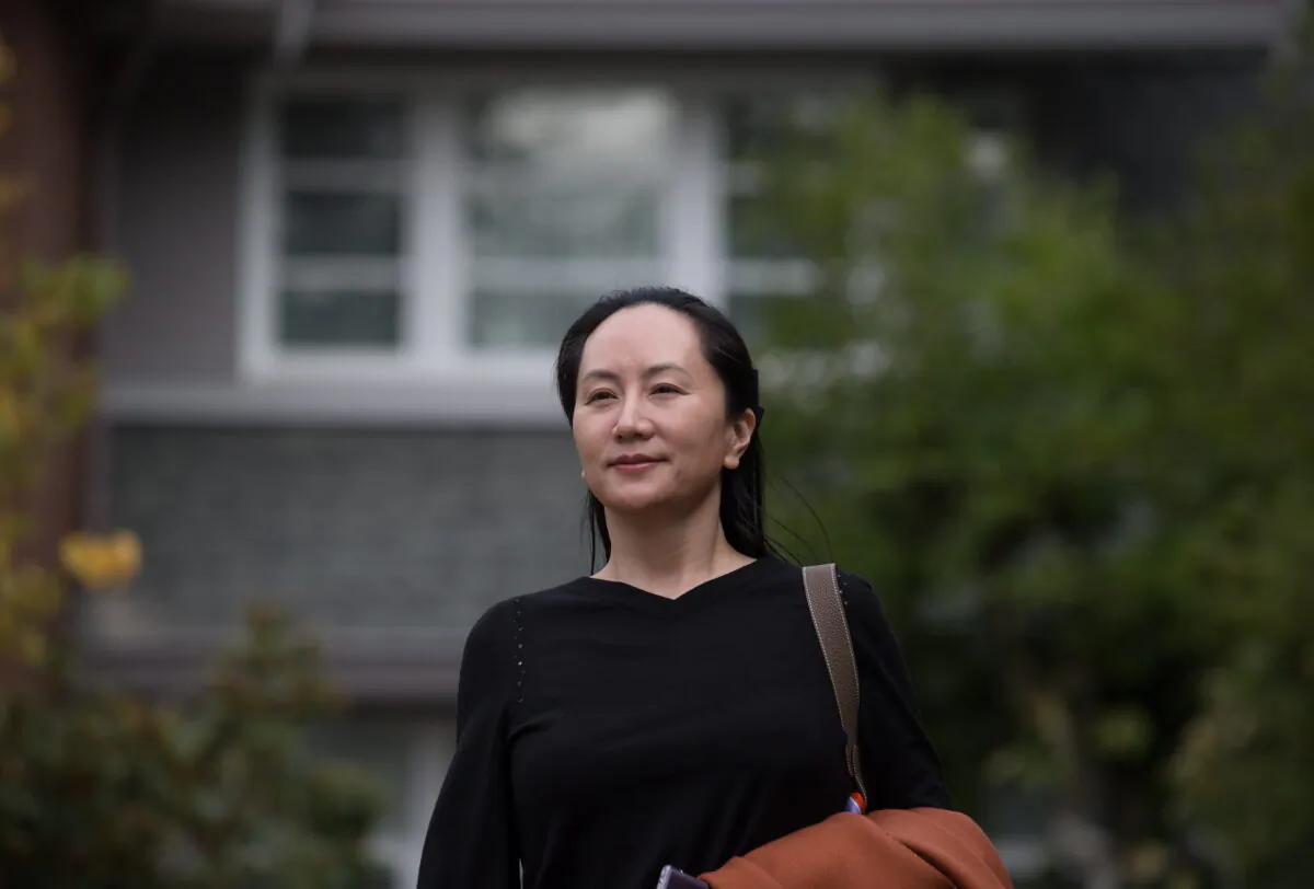 Huawei chief financial officer Meng Wanzhou leaves her home to attend a court hearing in Vancouver on Oct. 2, 2019. (The Canadian Press/Darryl Dyck)