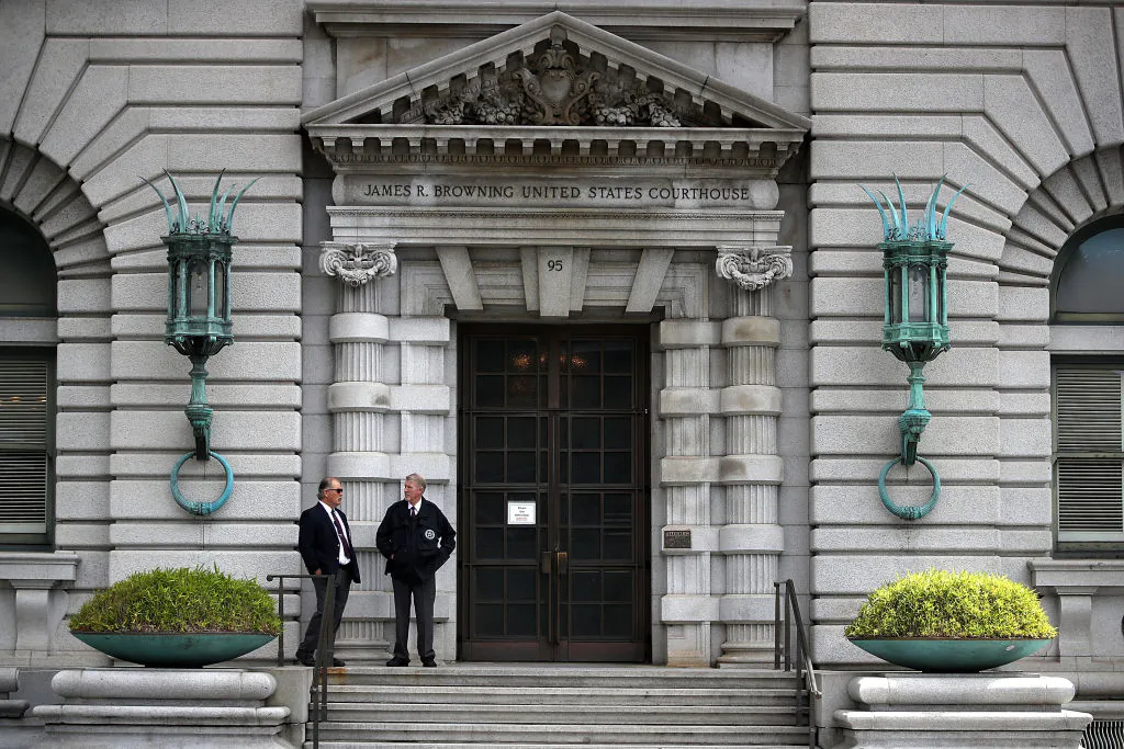 Security guards stand in front of the Ninth U.S. Circuit Court of Appeals in San Francisco, Calif., on June 12, 2017. (Justin Sullivan/Getty Images)