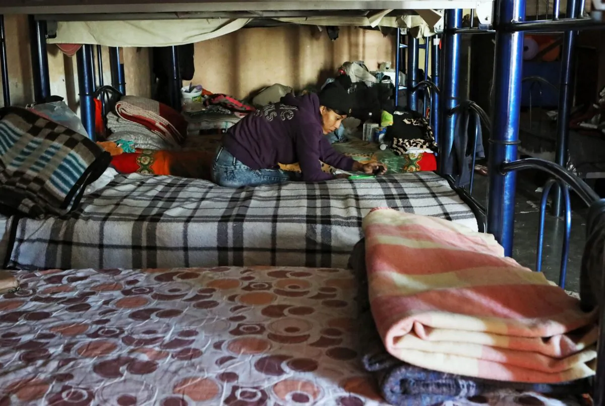 A Central American migrant remains at El Buen Samaritano shelter while waiting to apply for asylum in the United States, in Ciudad Juarez, Chihuahua state, Mexico, on Dec. 17, 2019. (Herika Martinez/AFP via Getty Images)