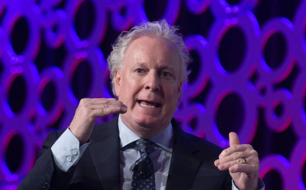 Jean Charest speaks during a panel discussion at the Canadian Aerospace Summit in Ottawa, Wednesday, Nov. 13, 2019. THE CANADIAN PRESS/Adrian Wyld
