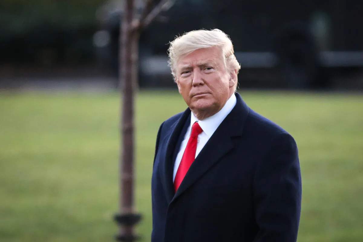 President Donald Trump walks on the South Lawn to board Marine One at the White House in Washington on Dec. 18, 2019. (Charlotte Cuthbertson/The Epoch Times)