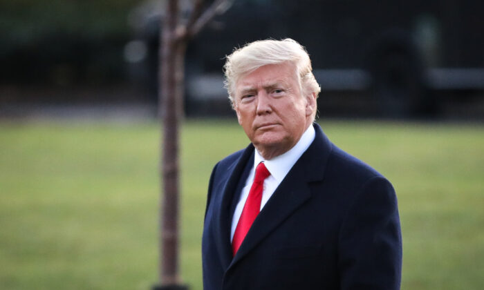 President Donald Trump walks on the South Lawn to board Marine One at the White House in Washington on Dec. 18, 2019. (Charlotte Cuthbertson/The Epoch Times)