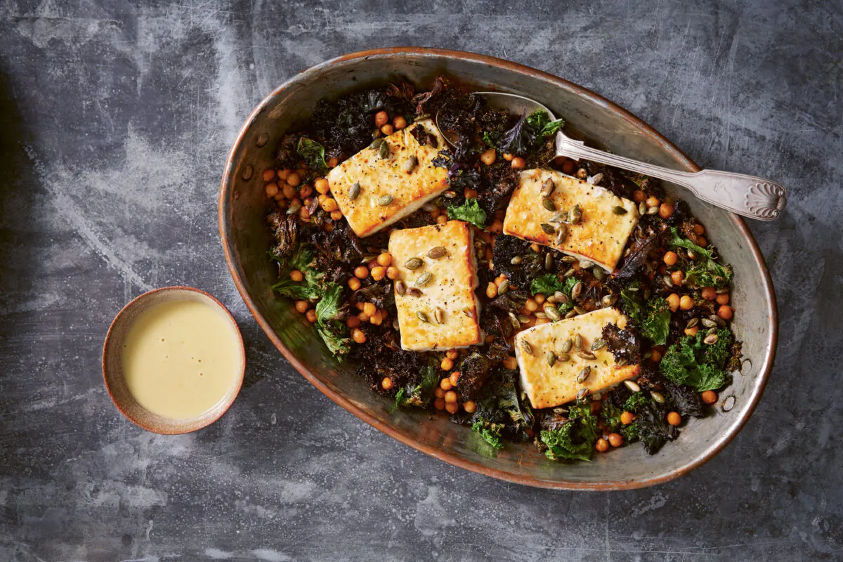Baked feta with greens and lemon-tahini dressing, one of Yasmin Fahr's go-to weeknight meals. (Patricia Niven)